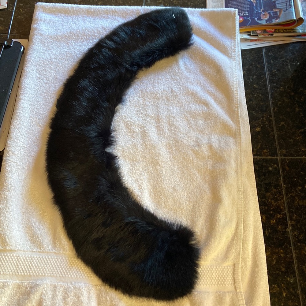 Furry collar in new shape. Add to costume or dress up. Satin back lining.